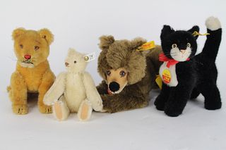Four Steiff Stuffed Animals