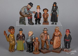 Group of carved and painted pine figures