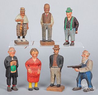 Seven carved and painted figures