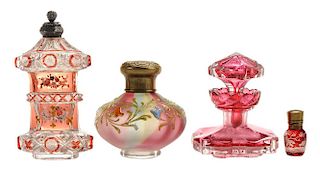 Four Small Perfume Bottles