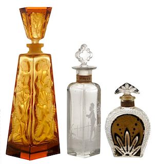 Three Perfume Bottles Including “Mary