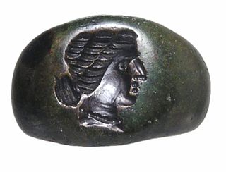 Ancient Bronze Roman Ring for a Child with an Intaglio Bust of a Woman 2nd - 3rd Cent. CE