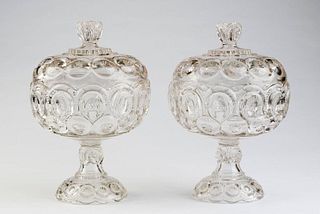 Pair of Early American Pattern Glass Colorless Compotes and Covers.
