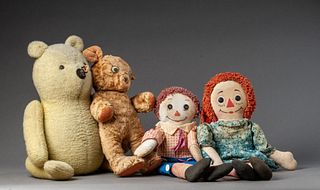 Group of Stuffed Dolls.