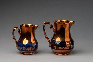 Two Copper Lustre Pitchers.