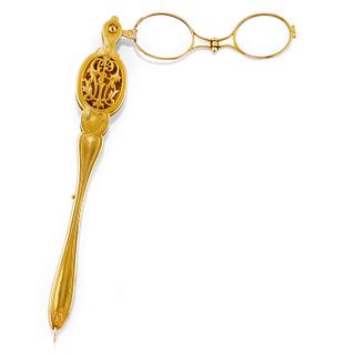 A 18K yellow gold lorgnette, defects