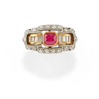 A silver, 18K yellow gold, ruby and diamond ring