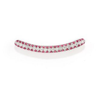 A 18K white gold, ruby and diamond brooch