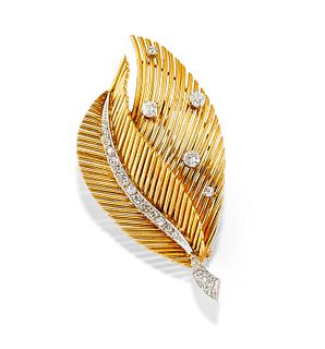 A 18K two-color gold and diamond brooch