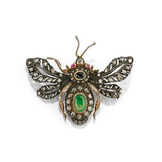 A silver, 18K yellow gold, emerald, sapphire, ruby and diamond brooch