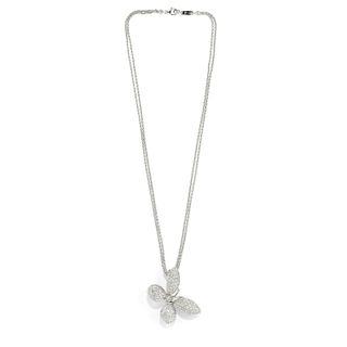 A 18K white gold and diamond necklace with pendant-brooch