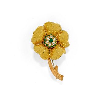 A 18K three-color gold, emerald and diamond brooch