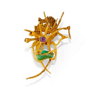 A 18K yellow gold and colored gemstones brooch