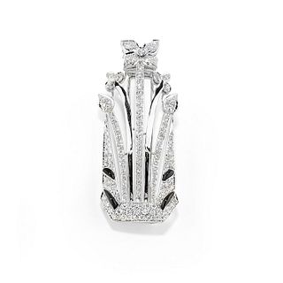 A 18K white gold, onyx and diamond pendant brooch