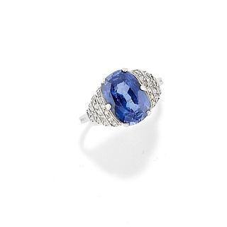 A 18K white gold, diamond and synthetic sapphire ring
