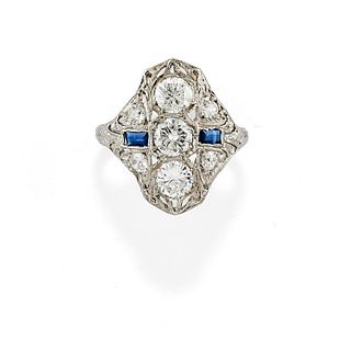 A platinum, diamond and sapphire ring