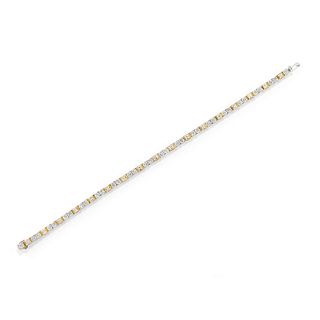 A 18K two-color gold and diamond tennis bracelet