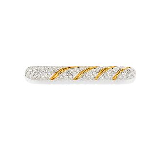 Two 18K two-color gold and diamond brooches