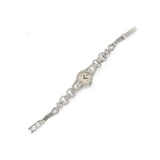 A 18K white gold and diamond lady's wristwatch, defects