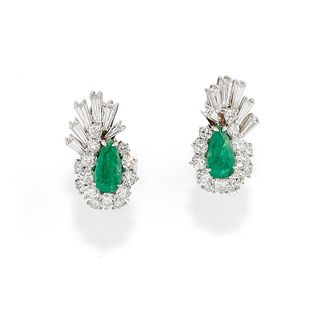 A 18K white gold, emerald and diamond earrings