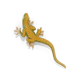 A 18K yellow gold, diamond and colored gemstone brooch