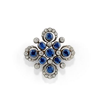 A silver, 18K yellow gold, diamond and sapphire brooch, with certificate