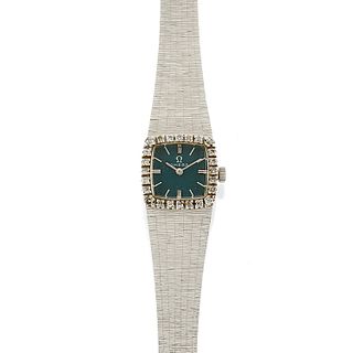 Omega - A 18K white gold and diamond lady's wristwatch, Omega