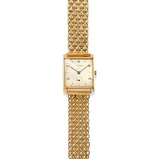 Longines - A 18K yellow gold wristwatch, Longines, defects (the bracelet is not original)