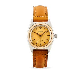Rolex - A stainless steel and gold wristwatch, Rolex, ref. 3132, circa 1945
