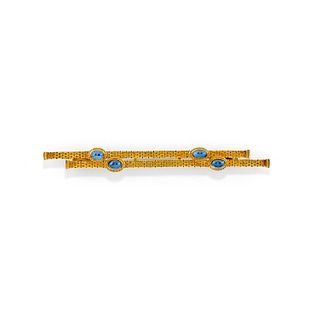 A 18K yellow gold and sapphire brooch