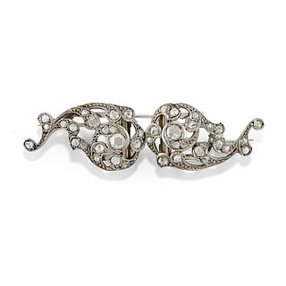 A 18K white gold and diamond brooch