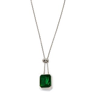 A silver, gold, green gemstone and diamond necklace