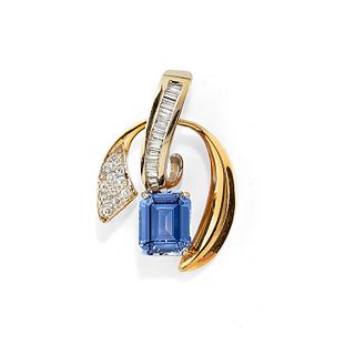 A 14K two-color gold, diamond and synthetic corundum pendant
