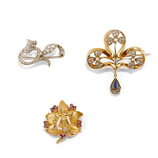 Three silver, low-carat gold, 18K yellow gold, ruby, diamond, micropearl and sapphire brooches