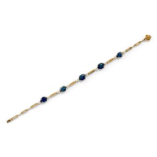 A 18K two-color gold, sapphire and diamond bracelet
