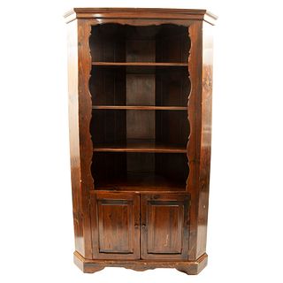Corner bookcase. 20th century. Carved in wood. With shelves, 2 swing doors and base supports. 79.9 x 38.9 x 22.8" (203 x 99 x 58 cm)