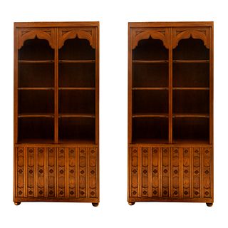 Pair of display cases. 20th century. Carved in wood. With shelves, 2 folding doors and bun-type supports. 77.5 x 36.2 x 14" (197 x 92 x 36 cm)