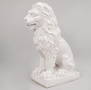 Lion. 20th century. Made of white glazed ceramic. 29.5 x 11 x 15.7" (75 x 28 x 40 cm)