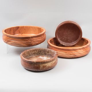 Lot of 4 salad bowls. Twentieth century. Circular design. Made of turned wood. Decorated with ribbed elements.