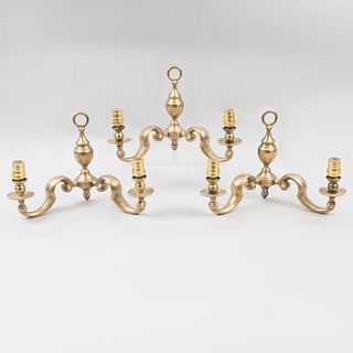 Lot of 3 flying buttresses. Spain. Twentieth century. Gilt bronze casting. For 2 lights each. With circular washers.