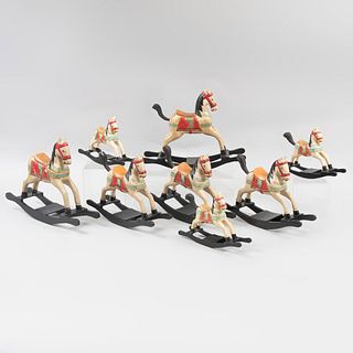 Lot of 8 toy horses. Twentieth century. Made of polychrome wood.