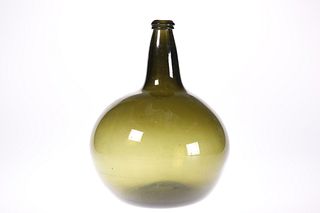 A LARGE GREEN GLASS ONION BOTTLE, with rough pont