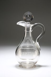 A GEORGE III GLASS CLARET JUG
 Circa 1790 
 Of ba