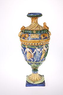 A LARGE MAIOLICA VASE, of urn form, moulded with 