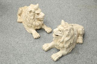 A LARGE PAIR OF POTTERY MODELS OF LIONS, modelled