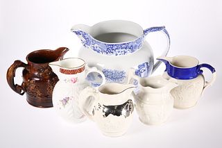 A COLLECTION OF SIX JUGS, including a large Spode