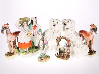 A GROUP OF VICTORIAN STAFFORDSHIRE POTTERY, compr