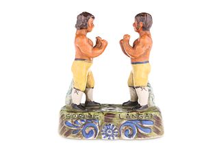A POTTERY FIGURE GROUP OF THE BARE-KNUCKLE BOXERS