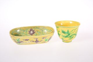 A CHINESE YELLOW GROUND BEAKER CUP, green painted