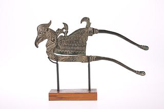 A SOUTH-EAST ASIAN PATINATED METAL ZOOMORPHIC BET